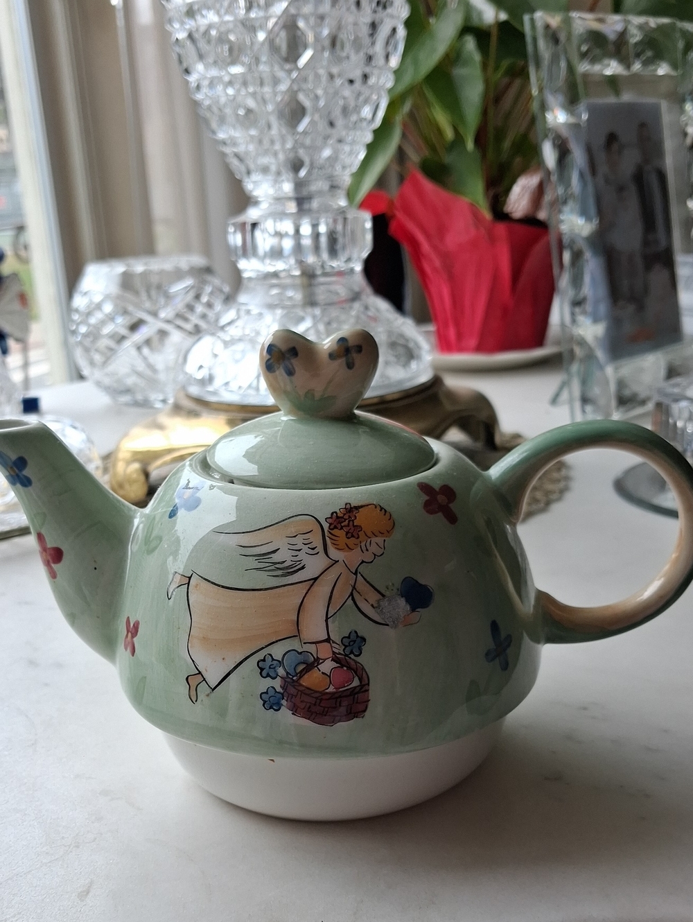 Green Ceramic Teapot with Angel Motif